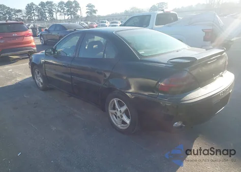 1999 Pontiac Grand Am Gt z USA, uszkodzony, nr VIN 1G2NW52E3XM938284